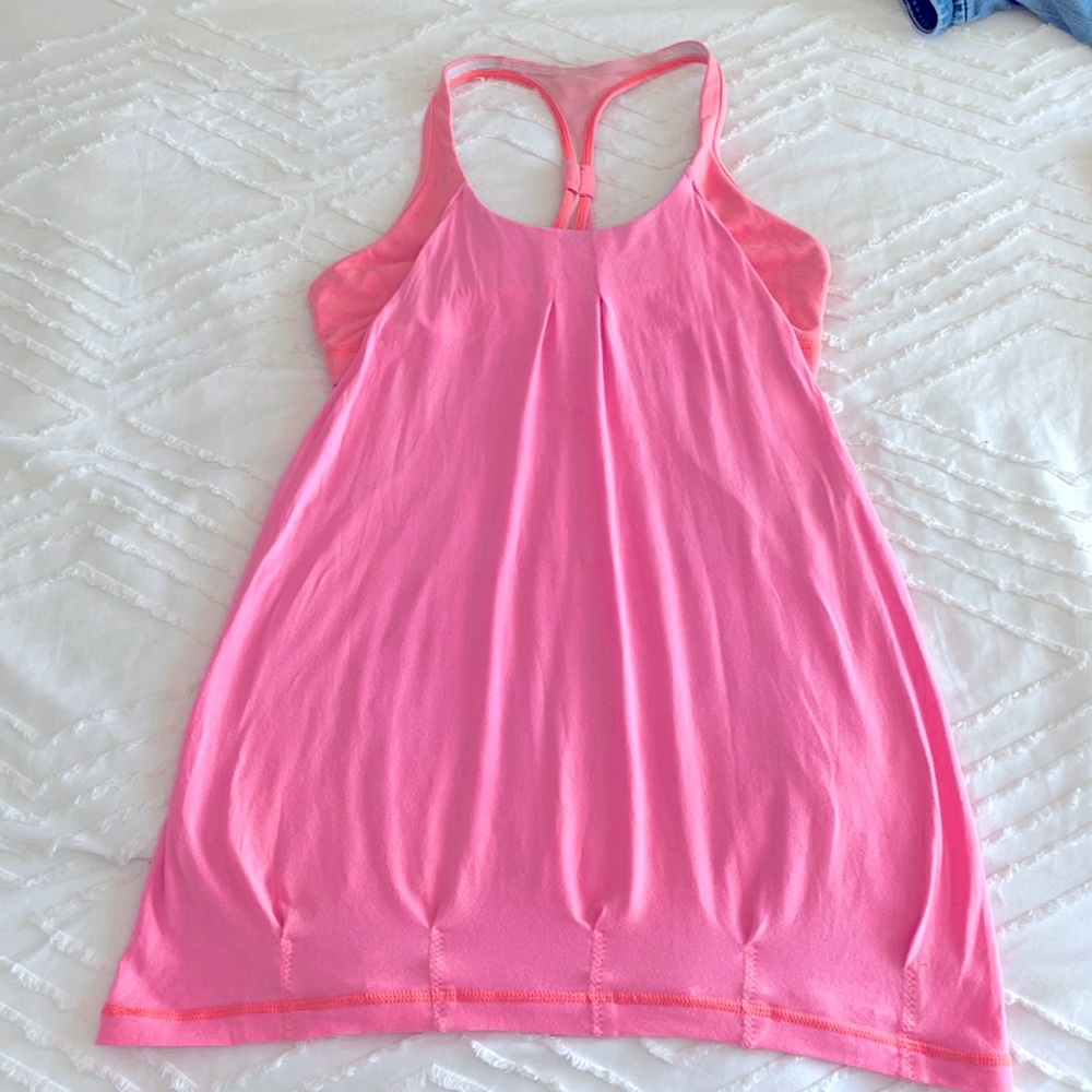 Sports tank with attached bra